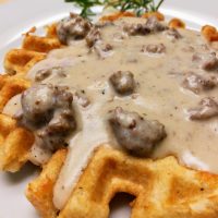 White Cheddar Biscuit Waffles with Rosemary Sausage Gravy