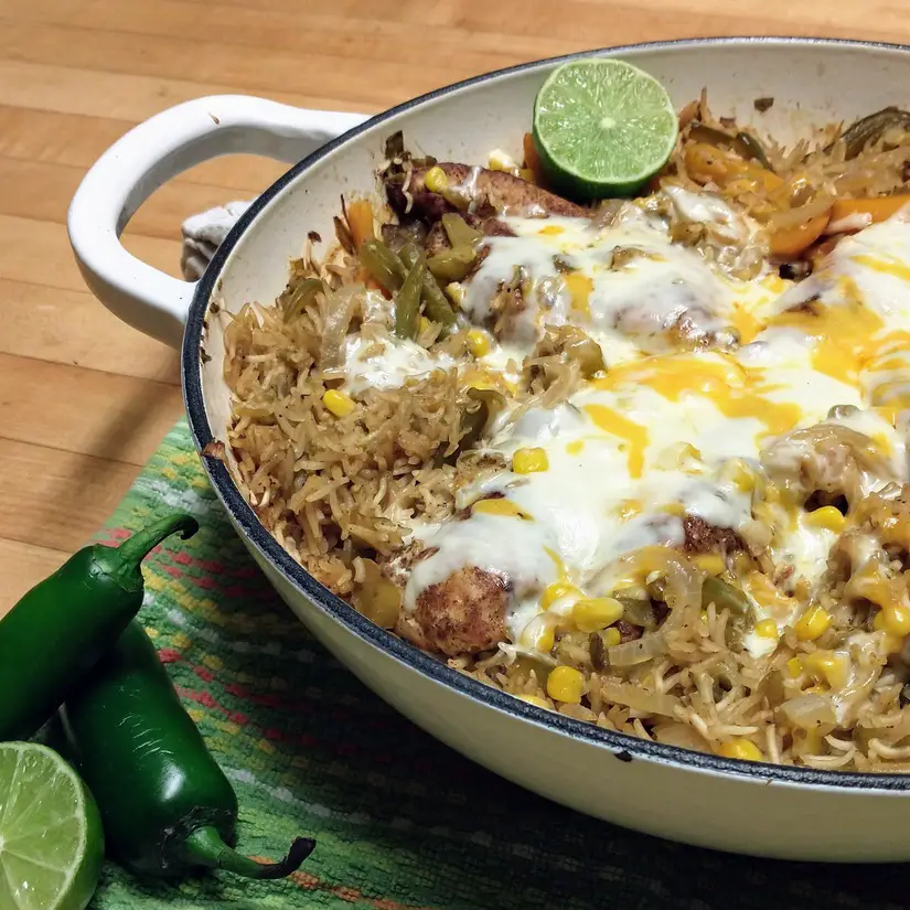 Cheesy Green Chile Chicken and Rice Skillet with Peppers, Onions, and Jalapenos