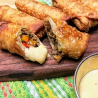 Philly Cheese Steak Egg Rolls with Mustard Cheese Dipping Sauce