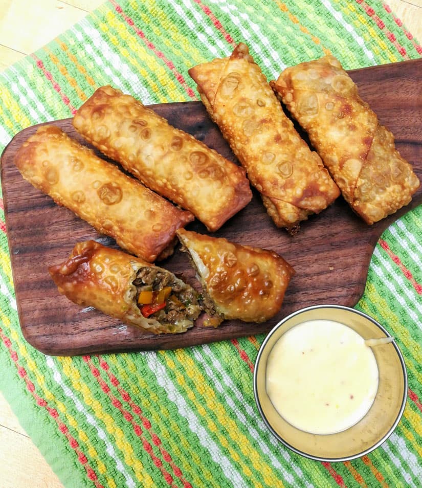 Philly Cheese Steak Egg Rolls with Easy Cheese Sauce
