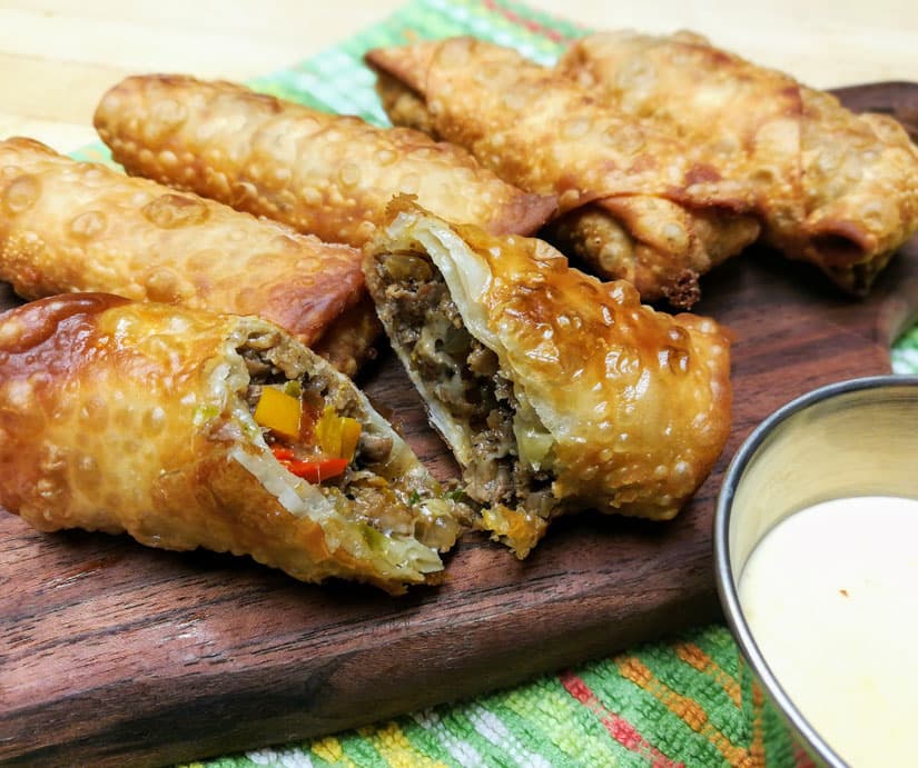 Philly Cheese Steak Inspired Egg Rolls with Quick Mustard Cheese Sauce