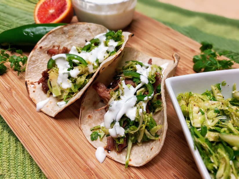 Pulled Pork Carnitas Tacos with Jalapeno Lime Brussels Sprout Slaw